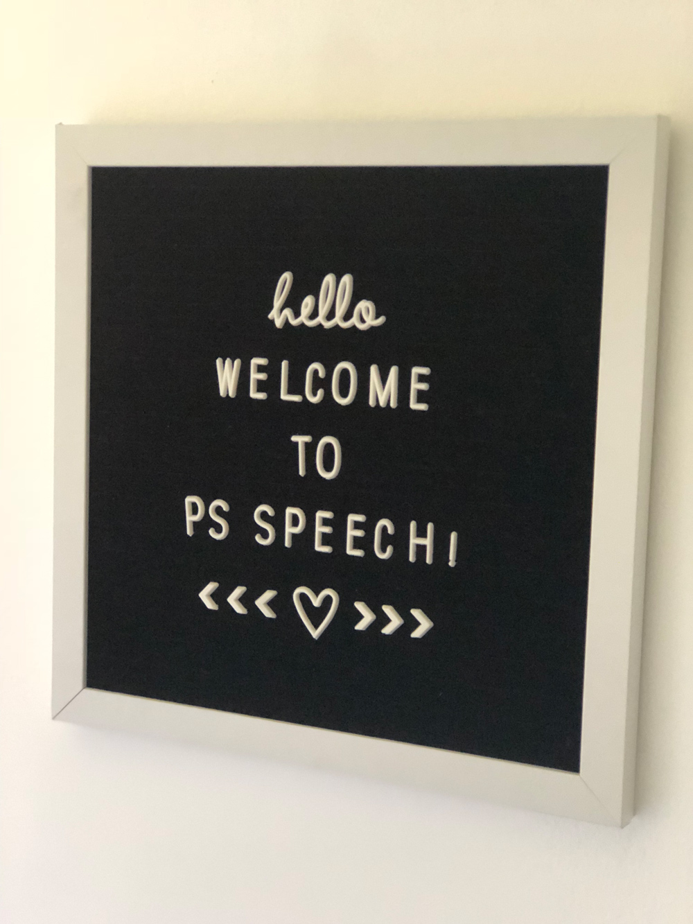 A text board that reads - hello, welcome to PS Speech.